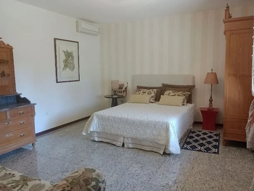 Foto 1 de Casa de Condomínio com 4 Quartos à venda, 230m² em Jardim Acapulco , Guarujá