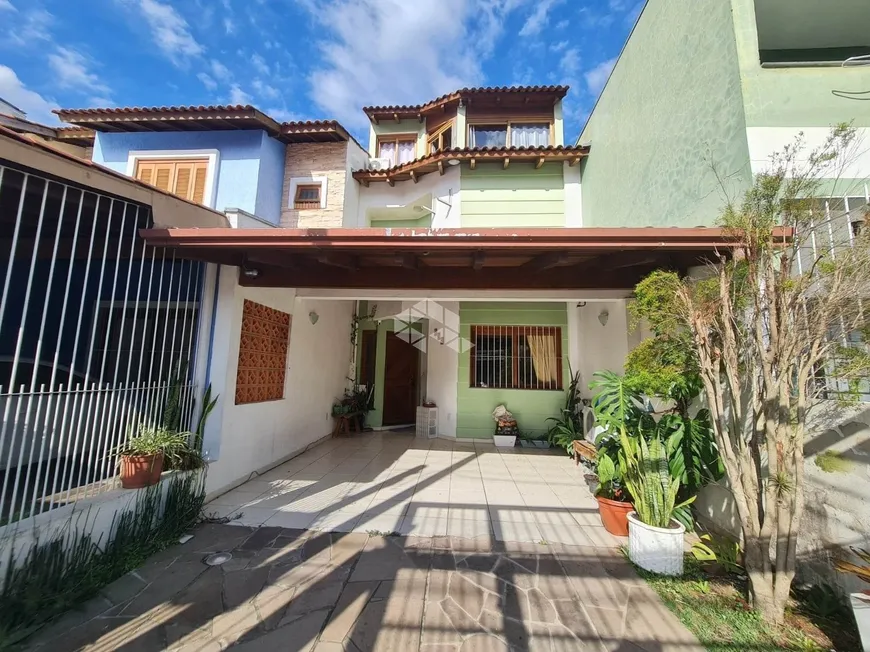 Foto 1 de Casa com 4 Quartos à venda, 136m² em Aberta dos Morros, Porto Alegre