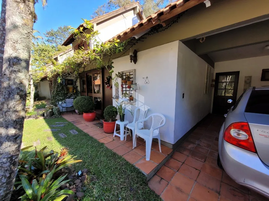 Foto 1 de Casa de Condomínio com 3 Quartos à venda, 221m² em Ipanema, Porto Alegre