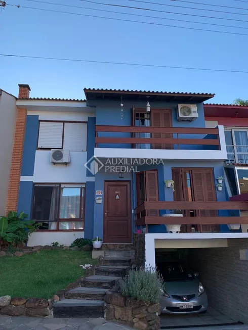 Foto 1 de Casa de Condomínio com 4 Quartos à venda, 102m² em Santo Antônio, Porto Alegre