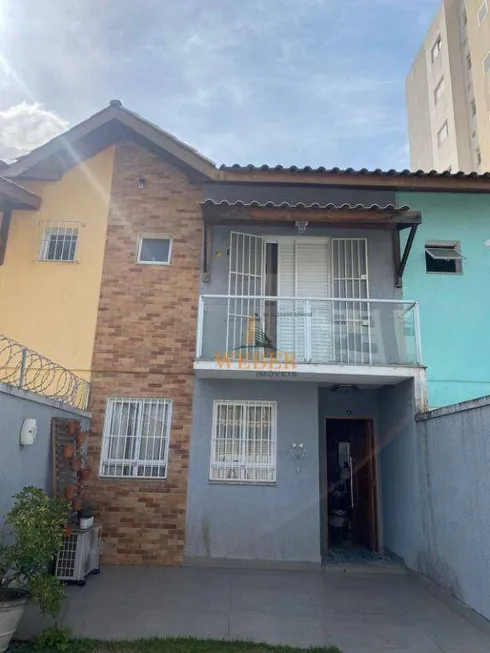 Foto 1 de Sobrado com 3 Quartos à venda, 112m² em Parque Assunção, Taboão da Serra