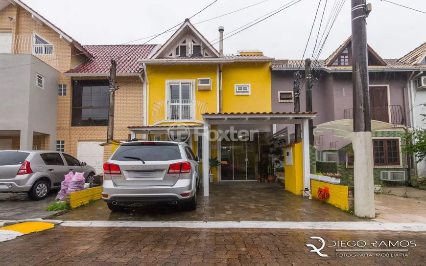 Foto 1 de Casa de Condomínio com 3 Quartos à venda, 162m² em Guarujá, Porto Alegre