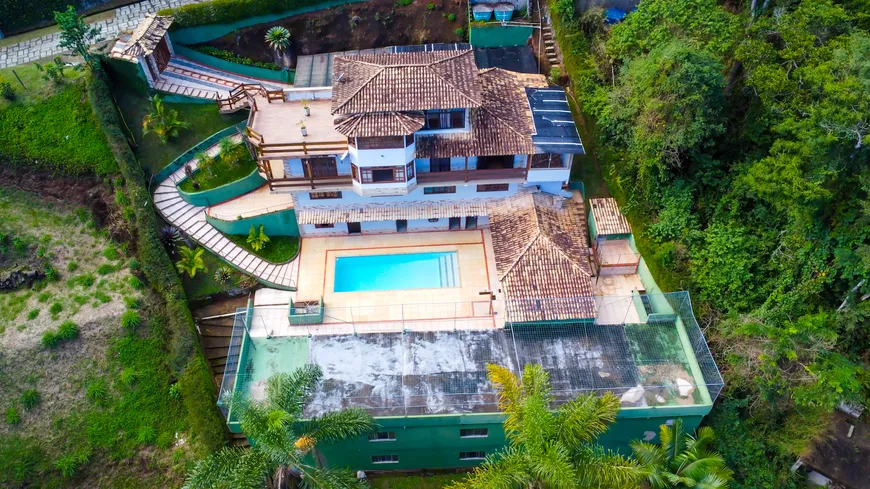 Foto 1 de Casa de Condomínio com 6 Quartos para venda ou aluguel, 900m² em Itaipava, Petrópolis