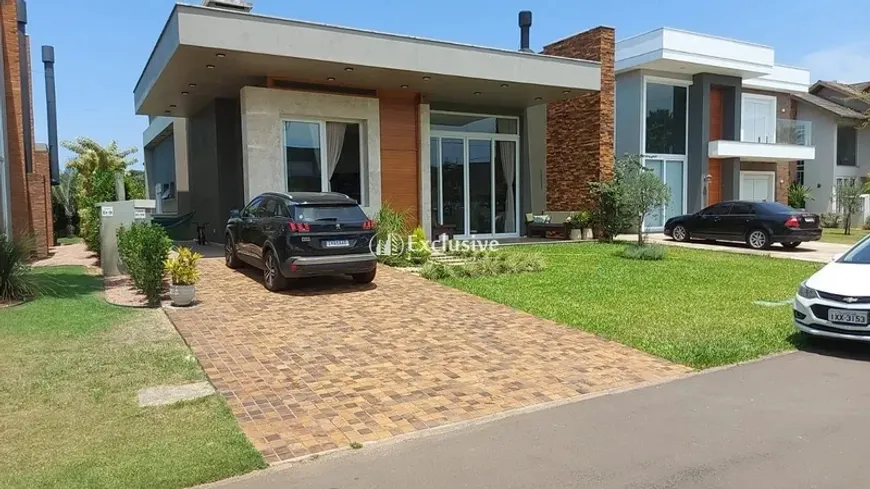 Foto 1 de Casa de Condomínio com 4 Quartos à venda, 255m² em Condominio Villagio de Atlantida, Xangri-lá