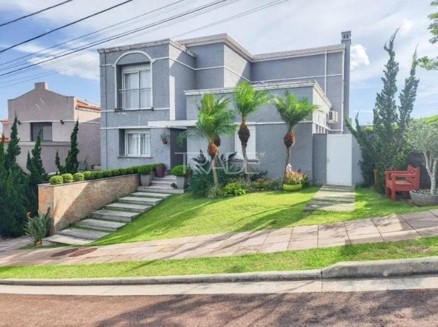Foto 1 de Casa de Condomínio com 3 Quartos à venda, 370m² em Alphaville, Porto Alegre