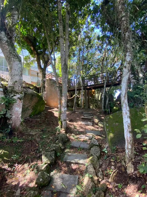 Foto 1 de Casa com 5 Quartos para venda ou aluguel, 1004m² em Cacupé, Florianópolis