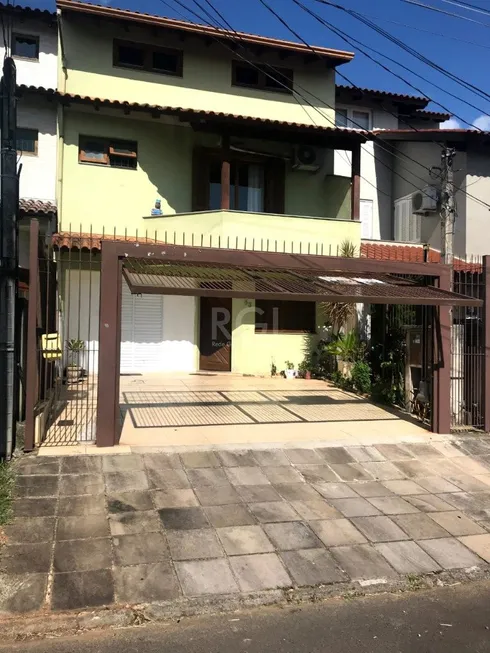 Foto 1 de Casa com 3 Quartos à venda, 199m² em Vila Nova, Porto Alegre