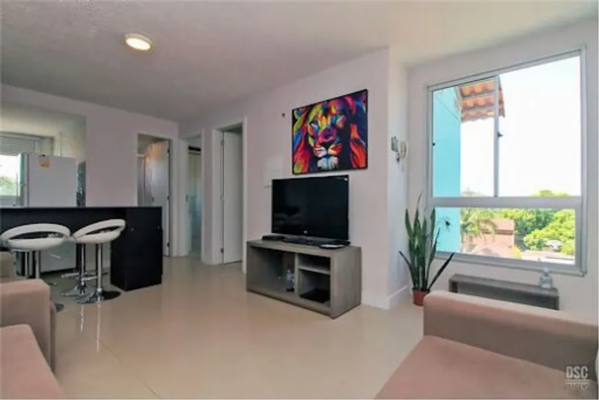 Foto 1 de Apartamento com 2 Quartos à venda, 47m² em Vila Nova, Porto Alegre