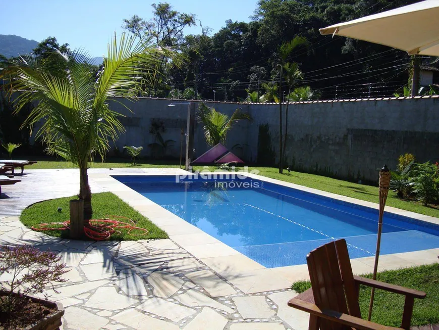 Foto 1 de Casa com 8 Quartos à venda, 305m² em Praia de Camburí, São Sebastião