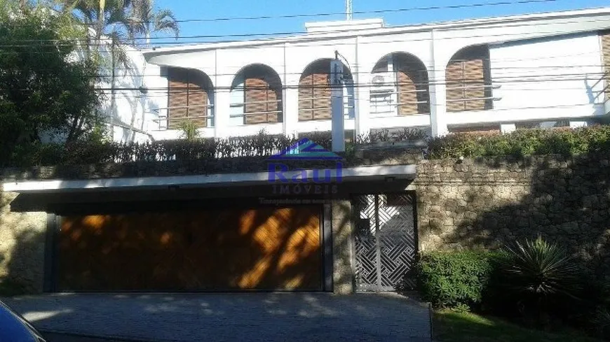 Foto 1 de Casa com 4 Quartos para venda ou aluguel, 945m² em Interlagos, São Paulo