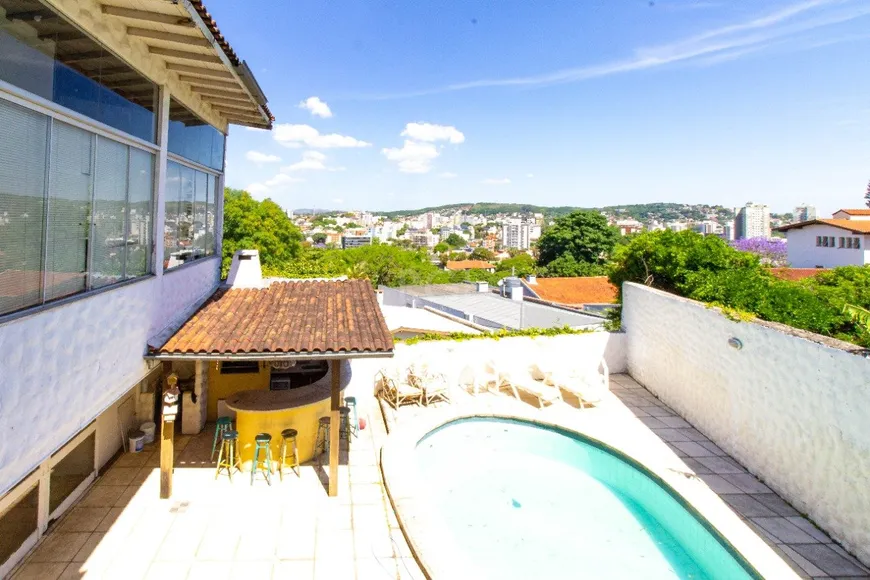 Foto 1 de Casa com 6 Quartos à venda, 423m² em Vila Assunção, Porto Alegre