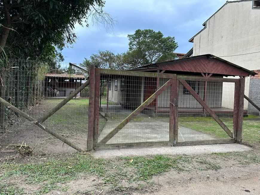 Foto 1 de Casa com 4 Quartos à venda, 360m² em Ibiraquera, Imbituba