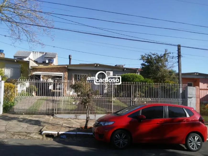 Foto 1 de Casa com 3 Quartos à venda, 120m² em Santa Fé, Porto Alegre