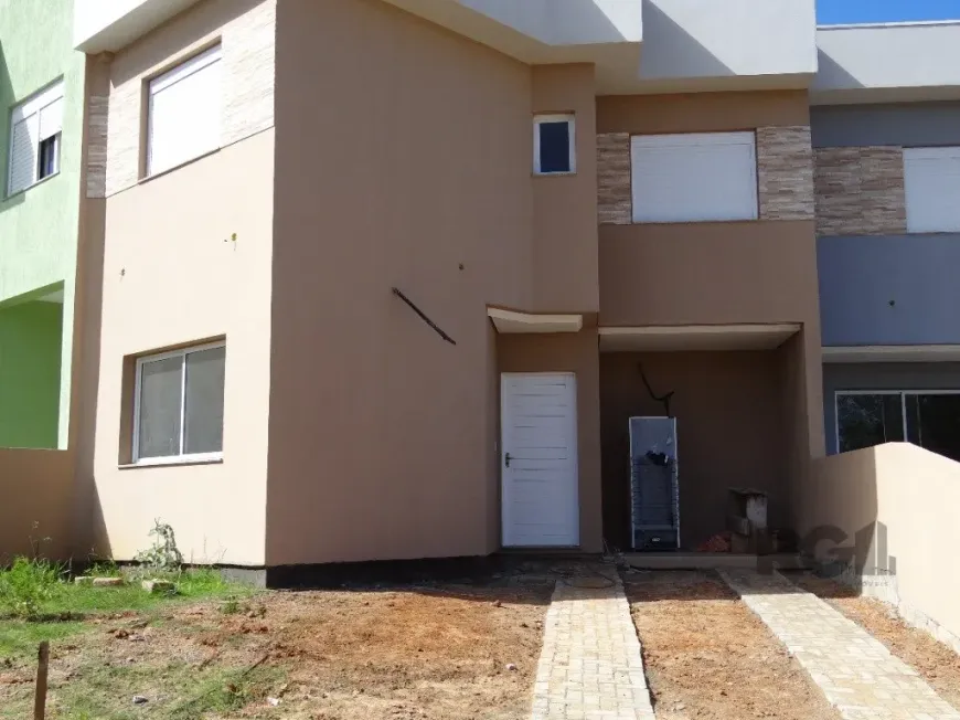 Foto 1 de Casa de Condomínio com 3 Quartos à venda, 110m² em Mário Quintana, Porto Alegre