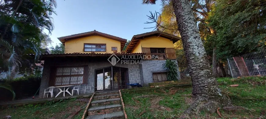 Foto 1 de Casa com 5 Quartos à venda, 250m² em Tristeza, Porto Alegre