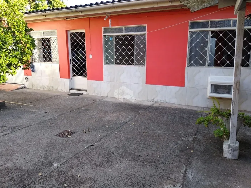 Foto 1 de Casa com 5 Quartos à venda, 190m² em Cristo Redentor, Porto Alegre