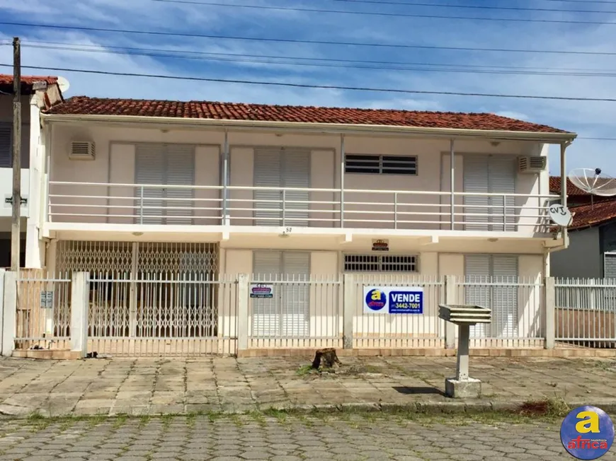 Foto 1 de Sobrado com 4 Quartos à venda, 150m² em Centro, Guaratuba