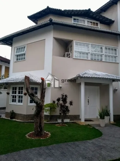 Foto 1 de Casa de Condomínio com 4 Quartos à venda, 450m² em Barra da Tijuca, Rio de Janeiro