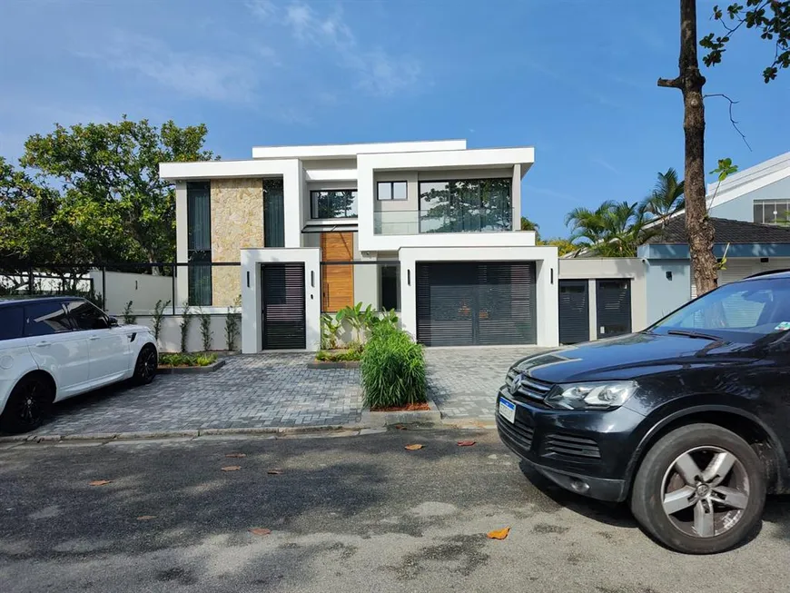 Foto 1 de Casa com 8 Quartos à venda, 1180m² em Barra da Tijuca, Rio de Janeiro