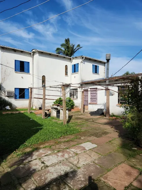 Foto 1 de Casa com 7 Quartos à venda, 880m² em Guarujá, Porto Alegre