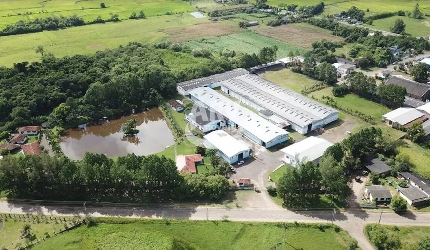 Foto 1 de Galpão/Depósito/Armazém para venda ou aluguel, 10010m² em Centro, Praia Grande