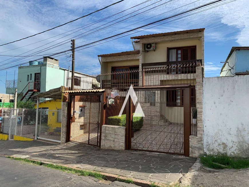 Foto 1 de Sobrado com 4 Quartos à venda, 229m² em São José, Porto Alegre