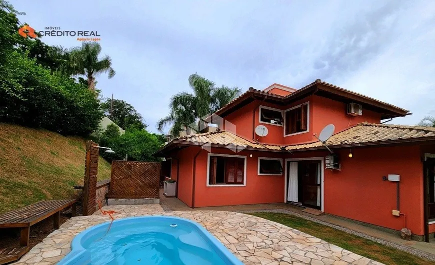 Foto 1 de Casa com 4 Quartos à venda, 243m² em Rio Tavares, Florianópolis