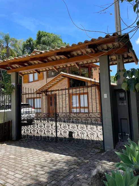 Foto 1 de Casa de Condomínio com 3 Quartos à venda, 130m² em Serra da Cantareira, Mairiporã