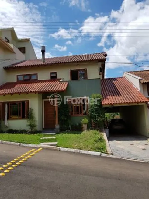 Foto 1 de Casa de Condomínio com 3 Quartos à venda, 189m² em Cavalhada, Porto Alegre