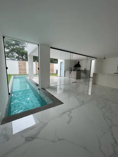 Foto 1 de Casa de Condomínio com 4 Quartos à venda, 496m² em Recreio Dos Bandeirantes, Rio de Janeiro