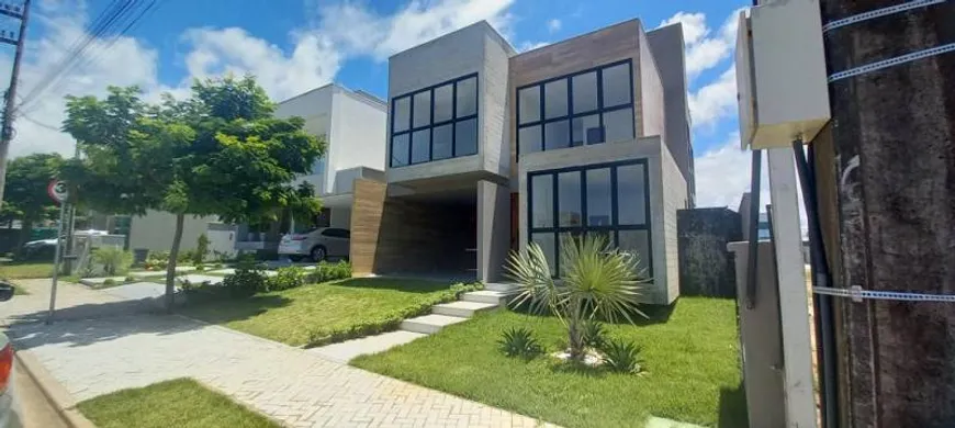 Foto 1 de Casa de Condomínio com 4 Quartos à venda, 257m² em Cidade Alpha, Eusébio