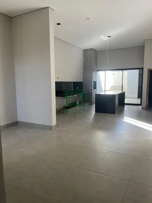 Foto 1 de Casa com 3 Quartos à venda, 172m² em Bosque dos Buritis, Uberlândia