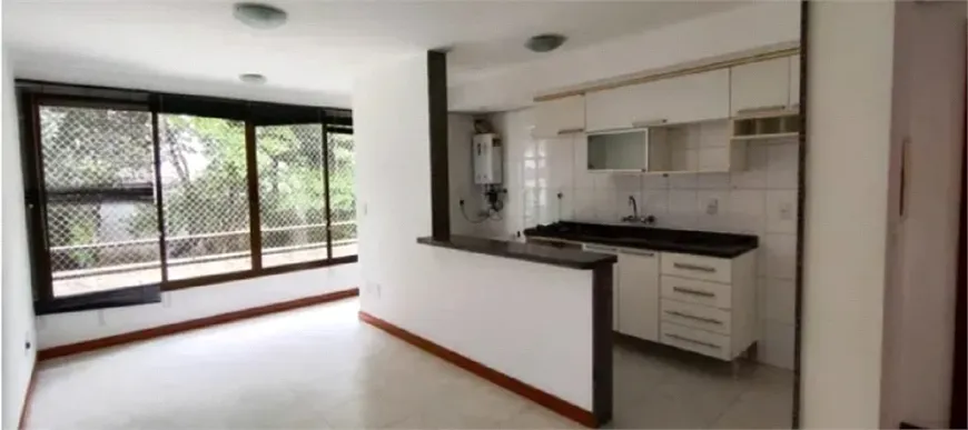 Foto 1 de Apartamento com 1 Quarto à venda, 50m² em Independência, Porto Alegre