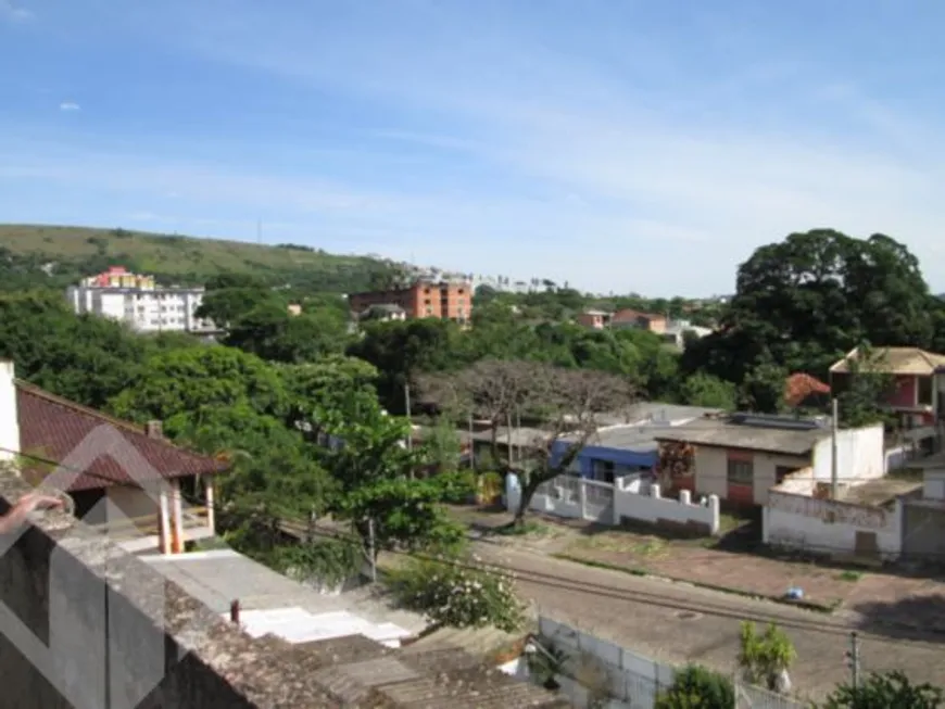 Foto 1 de Casa com 5 Quartos à venda, 180m² em Nonoai, Porto Alegre