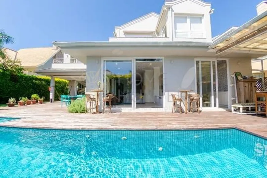 Foto 1 de Casa com 4 Quartos à venda, 300m² em Jurerê Internacional, Florianópolis