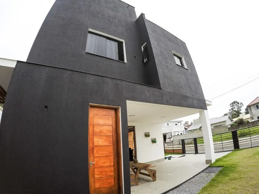 Foto 1 de Casa de Condomínio com 4 Quartos à venda, 240m² em Canasvieiras, Florianópolis