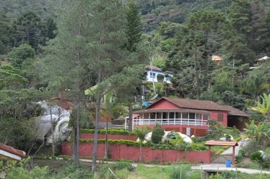 Foto 1 de Casa de Condomínio com 5 Quartos à venda, 192m² em Colônia Alpina, Teresópolis