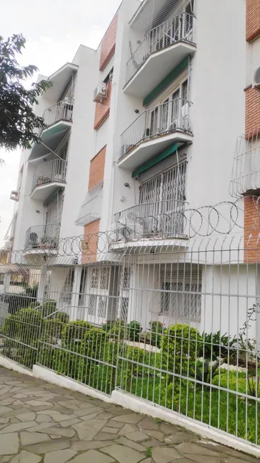 Foto 1 de Apartamento com 2 Quartos à venda, 70m² em Santo Antônio, Porto Alegre