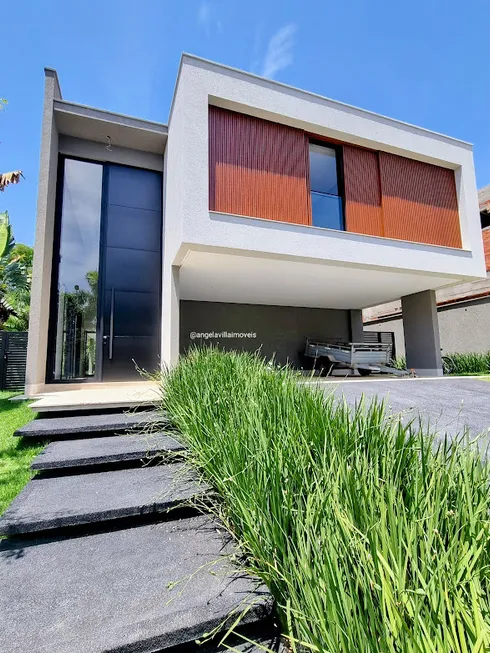 Foto 1 de Casa de Condomínio com 5 Quartos à venda, 453m² em Alphaville Ipês, Goiânia