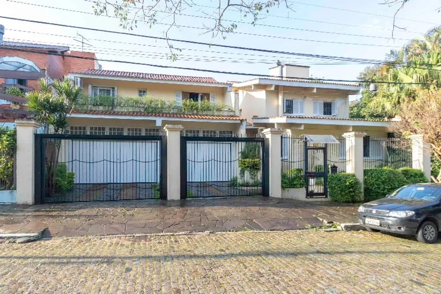 Foto 1 de Casa com 5 Quartos à venda, 421m² em Nonoai, Porto Alegre