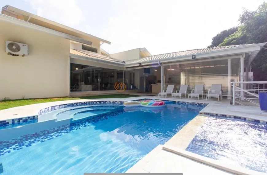Foto 1 de Casa de Condomínio com 4 Quartos para venda ou aluguel, 495m² em Loteamento Alphaville Campinas, Campinas