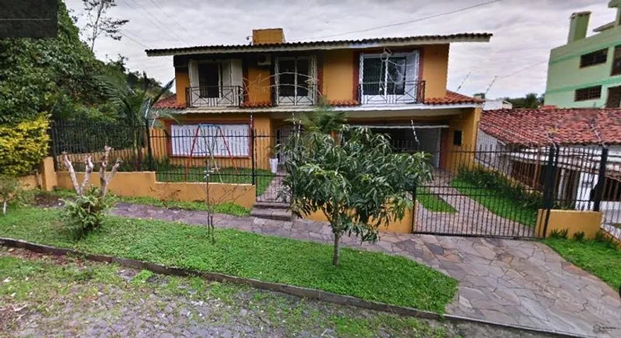 Foto 1 de Casa com 4 Quartos à venda, 398m² em Nossa Senhora de Lourdes, Santa Maria