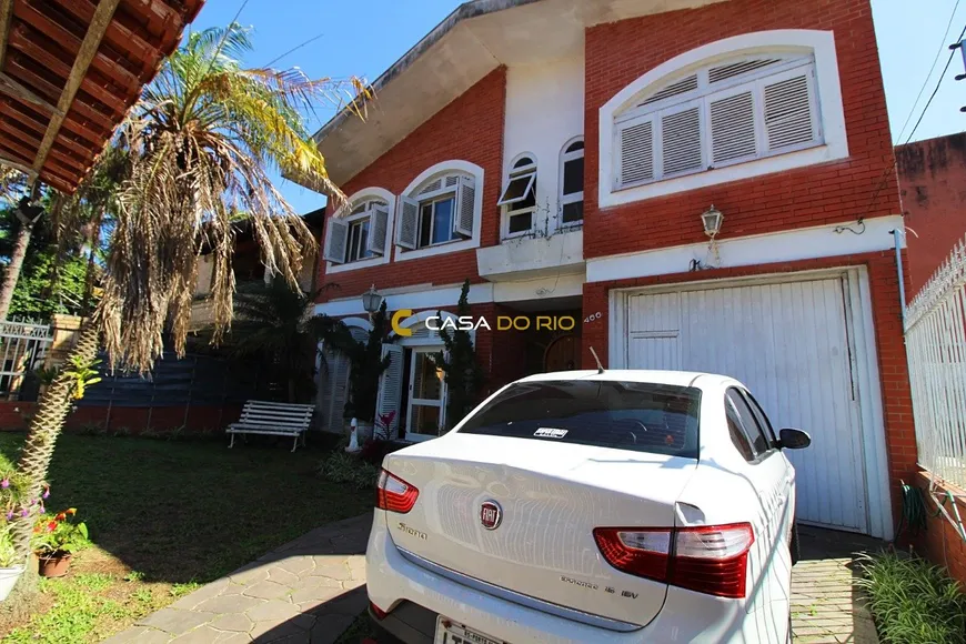 Foto 1 de Casa com 4 Quartos à venda, 247m² em Tristeza, Porto Alegre