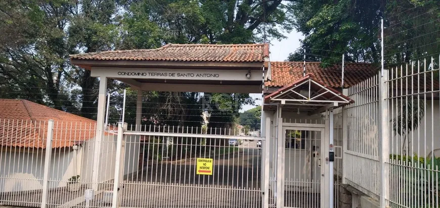 Foto 1 de Casa de Condomínio com 4 Quartos à venda, 249m² em Santo Antônio, Porto Alegre