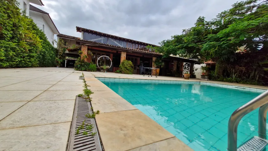 Foto 1 de Casa com 4 Quartos à venda, 450m² em Barra da Tijuca, Rio de Janeiro