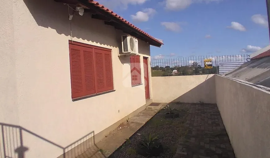Foto 1 de Casa de Condomínio com 2 Quartos à venda, 49m² em Tarumã, Viamão
