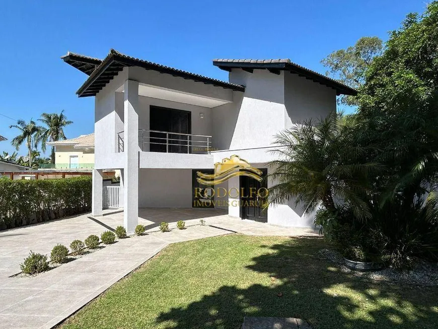 Foto 1 de Casa de Condomínio com 5 Quartos à venda, 400m² em Enseada, Guarujá