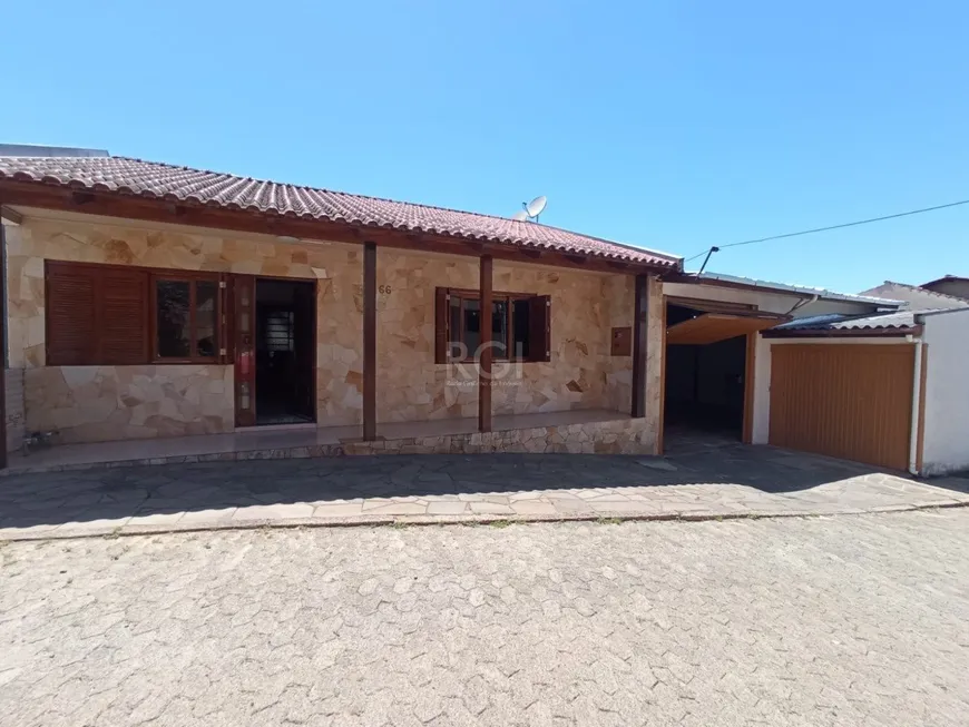 Foto 1 de Casa com 3 Quartos à venda, 261m² em Vila Nova, Porto Alegre