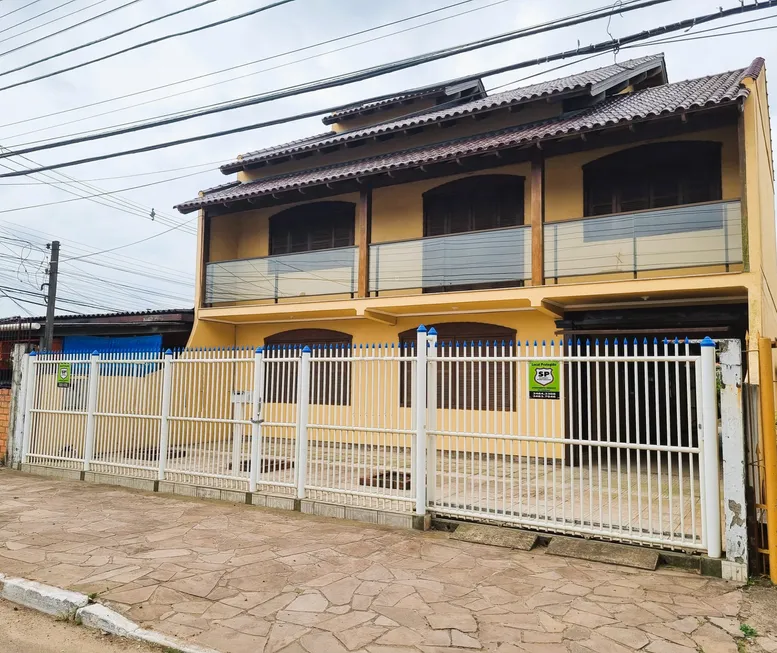 Foto 1 de Sobrado com 6 Quartos à venda, 300m² em Niterói, Canoas