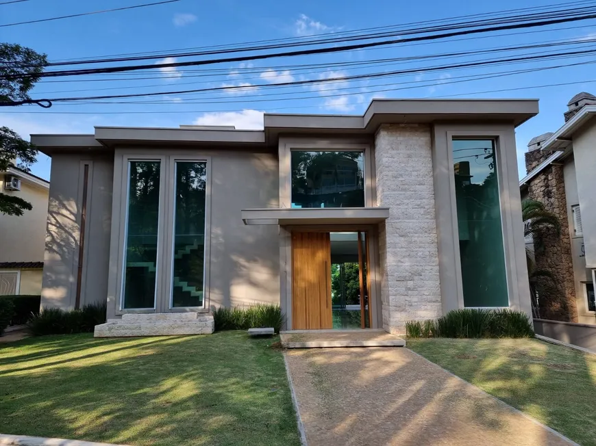 Foto 1 de Casa de Condomínio com 5 Quartos para venda ou aluguel, 729m² em Alphaville, Santana de Parnaíba